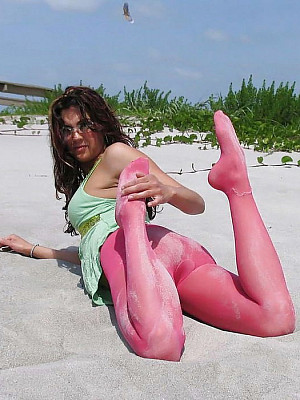 Nasty amateur girls posing outdoor in their colored pantyhose